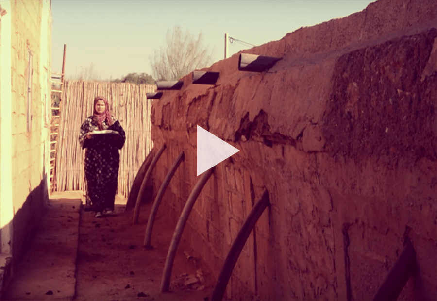 Indian woman walking through an aisle