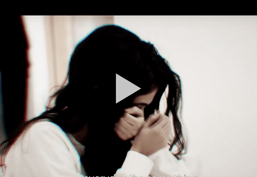 woman covering her face