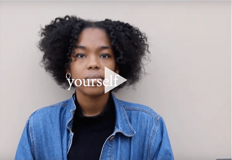 African American teen looking straight at camera