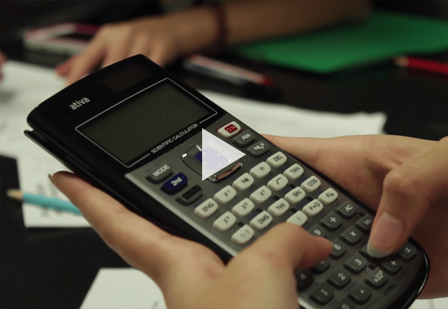 Someone holding a calculator